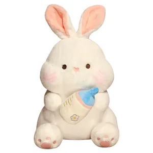 Adorable white plush bunny doll holding a colorful baby bottle soothing soft rabbit toy