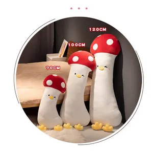 Comparaison visuelle de trois tailles de traversins en peluche de poussin champignon