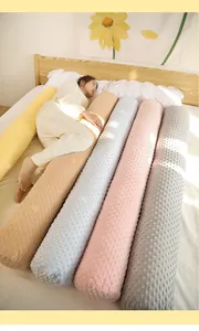 Traversin cylindrique doux en velours à pois pour un sommeil confortable