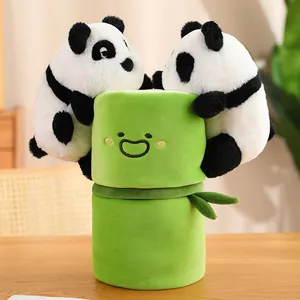 Adorable panda plush toy set with a smiling green bamboo tube base for home decoration