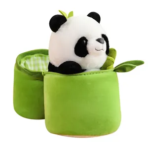 Adorable soft panda plush toy sitting inside a green zippered bamboo-shaped bag