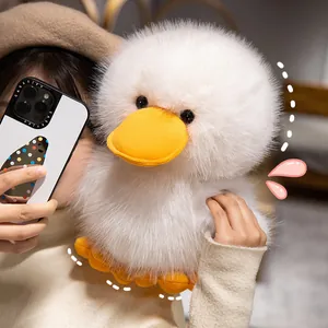 Adorable fluffy white duck plush toy with soft fur and orange beak for home decor