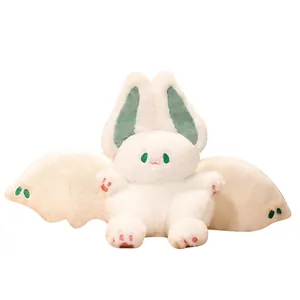 Cute white plush rabbit with large bat wings and green ears, soft comfort stuffed animal toy
