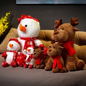 Soft plush Christmas toy collection featuring various sized reindeer and snowmen.