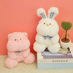 Soft plush bunny and pig stuffed animals with cute bow ties for kids' gift.