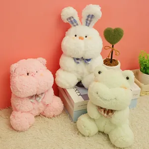Cute plush toy set featuring white rabbit pink pig and green frog in soft fluffy texture
