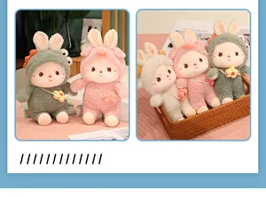 Close-up of three cute plush bunny dolls in colorful animal outfits and flower bags