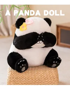 Soft plush giant panda doll toy with flower accents in shy sitting pose for kids gift