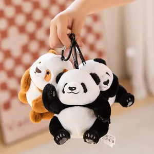 Adorable panda plush keychain set held by hand, cute souvenir toy for kids and gift