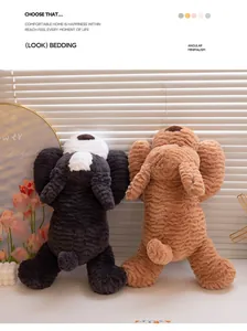 Soft plush puppy toys in Schnauzer and Golden Retriever styles leaning on blinds.