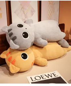 Close-up of soft grey and orange plush cat pillows, long cat bolster for sleeping comfort