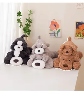 Group of three soft plush dog toys in Schnauzer, Border Collie, and Golden Retriever styles.