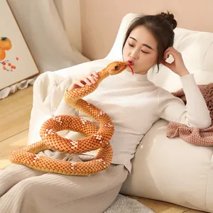 Realistic snake plush toy in orange and white scales, perfect for prank or zodiac gift