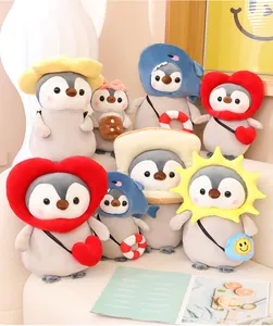 Colección de adorables peluches de pingüinos con creativos gorros de tiburón y girasol