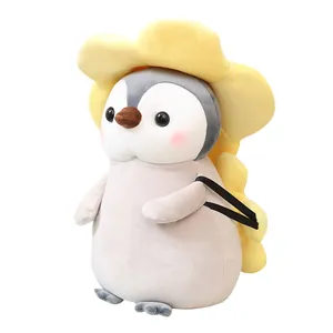 Peluche de pingüino suave con sombrero de flor amarilla, regalo creativo para niños