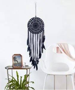Black handmade macrame dreamcatcher wall hanging for minimalist bohemian home decor