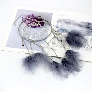 Elegant Mori-style dreamcatcher with gray feathers and LED fairy lights wall hanging