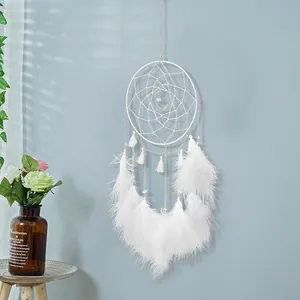 White forest style dreamcatcher wall hanging decor with soft feathers and moon charm