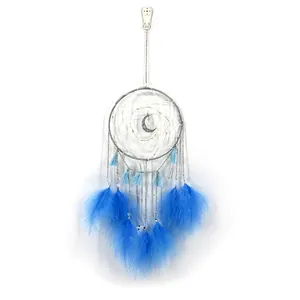 Blue dreamcatcher wall hanging with moon charm and feathers for home decor