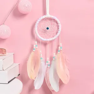 Magnifique attrape-rêves rose fait main avec plumes et perles pour décoration murale chambre