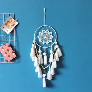 Nordic style white dreamcatcher wall hanging with tassels and wooden beads for home decor