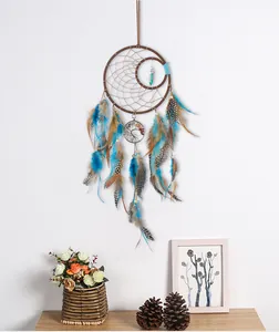 Handmade dream catcher with Tree of Life charm and blue feathers hanging decoration