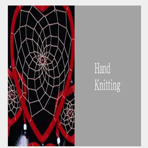 Macro view of heart-shaped dreamcatcher featuring hand-knitted intricate web pattern
