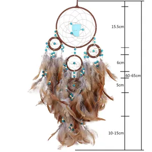Handmade brown feather dreamcatcher wall hanging with turquoise beads and five circles