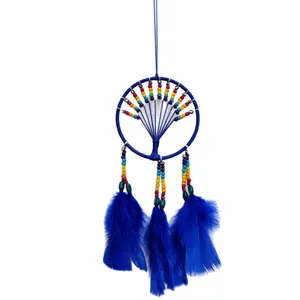 Handmade blue dreamcatcher with colorful rainbow beads and feathers for home decor.