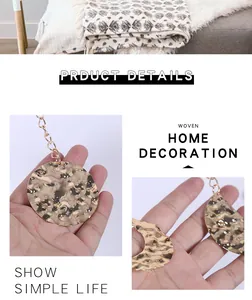 Detailed view of hammered gold metal discs for Bohemian style moon phase wall hanging decor