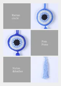 Handmade crochet evil eye wall hanging detail showing rattan circle and blue tassel texture.