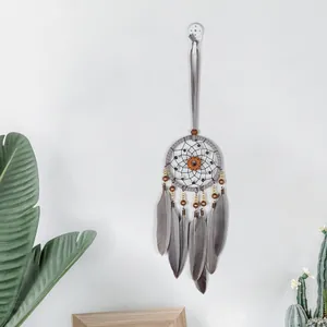 Retro dreamcatcher wall hanging with grey feathers and wooden beads home decor