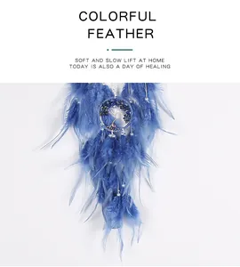 Detailed view of blue feathers and crushed stones on a Tree of Life dreamcatcher