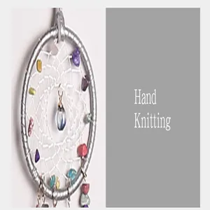 Close-up detail of handmade dreamcatcher pendant featuring colorful gravel stones