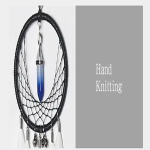 Handwoven black dreamcatcher featuring a blue crystal pendant and white feathers