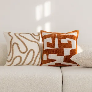 Coussins décoratifs modernes de style Maillard aux motifs géométriques ondulés