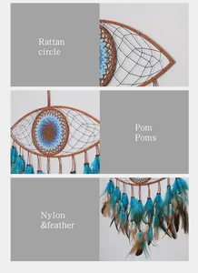 Detailed view of handmade Evil Eye dreamcatcher with rattan, pom poms and feathers