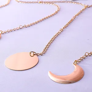 Bohemian gold metal moon phase wall hanging garland with crescent and circle charms