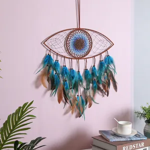 Beautiful handmade blue evil eye dreamcatcher wall hanging with vibrant feathers