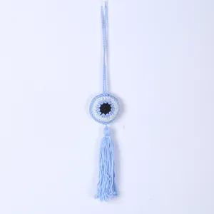 Handmade blue crochet Evil Eye wall hanging ornament for car and home with long tassel