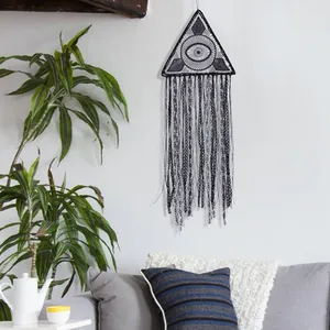 Handmade black triangular dreamcatcher with evil eye pattern for Halloween wall hanging