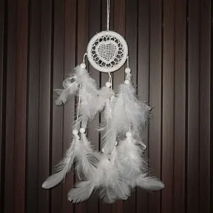 Handmade white heart dreamcatcher with soft feathers and beads for wall hanging
