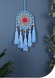 Handmade blue crochet dreamcatcher wall hanging with elegant cotton tassels and beads