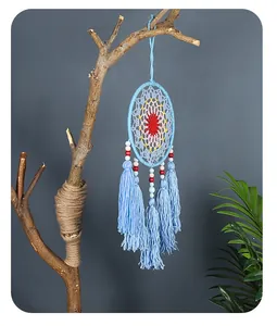 Elegant blue handmade knitted dreamcatcher wall hanging with tassels and colorful beads