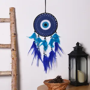 Handmade Bohemian Evil Eye dreamcatcher wall hanging with blue feathers for home