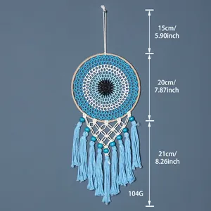 Handmade evil eye dream catcher wall hanging with blue tassels and beads decoration