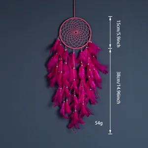 Atrapasueños de plumas rosas hecho a mano para decoración de pared de estilo bohemio
