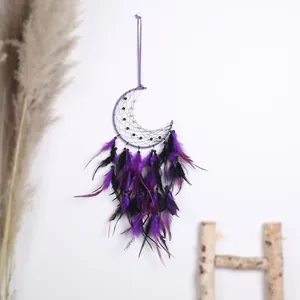 Handmade purple and black moon dreamcatcher with feathers for wall hanging decor
