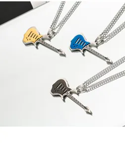 Detail view of punk rock guitar necklaces in gold, blue, and black finishes