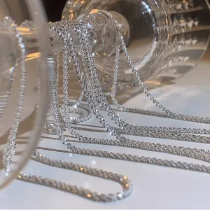 Elegant minimalist sparkling silver choker necklace with a unique starry glitter texture